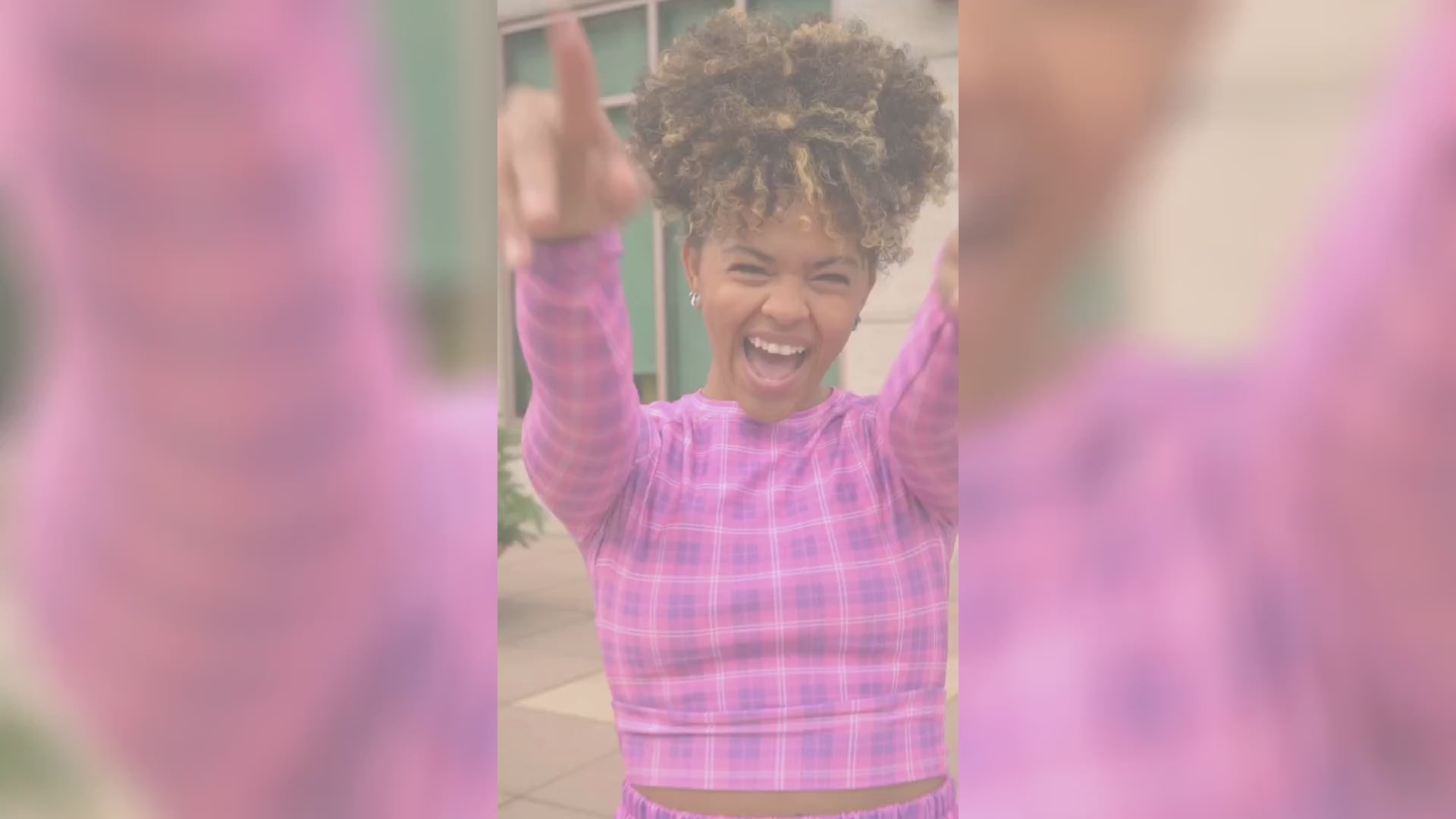 Load video: Woman wearing purple and indigo pink long-sleeve crop top during working out