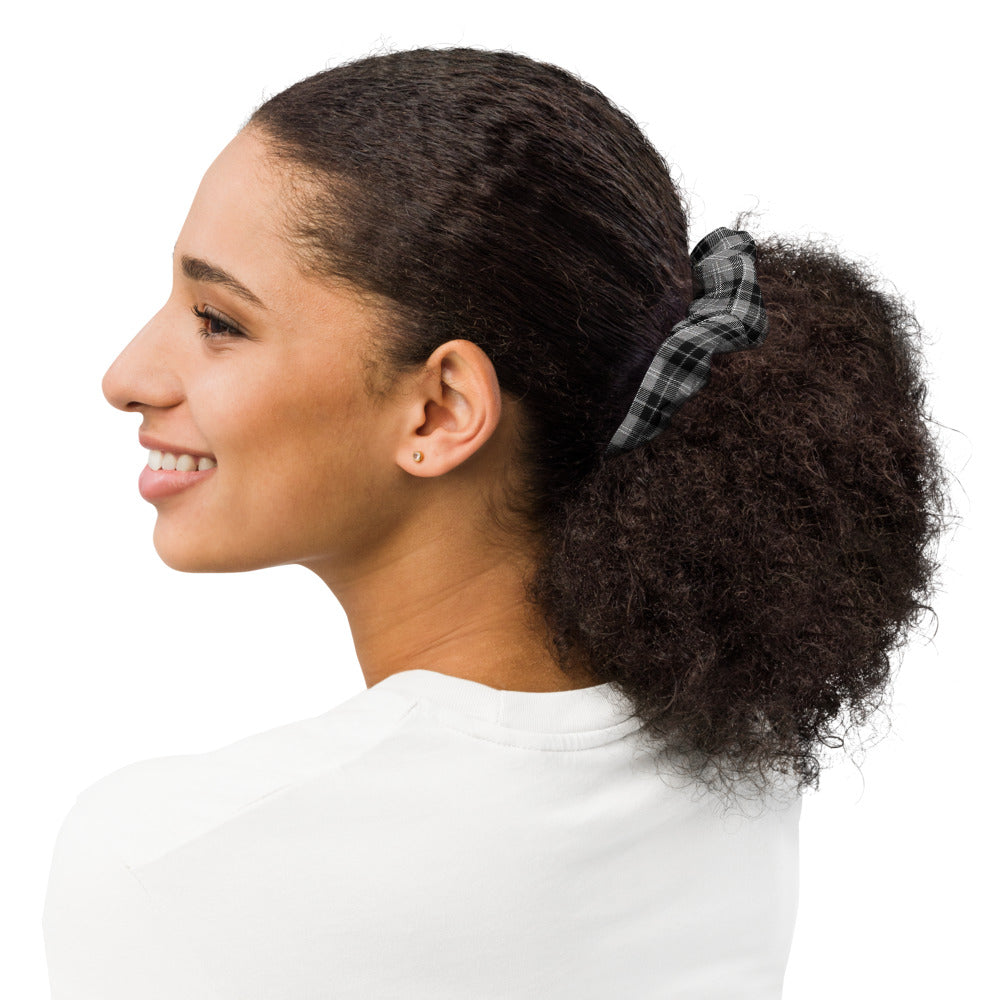 Profile photo of a woman with a Black and White Scrunchie